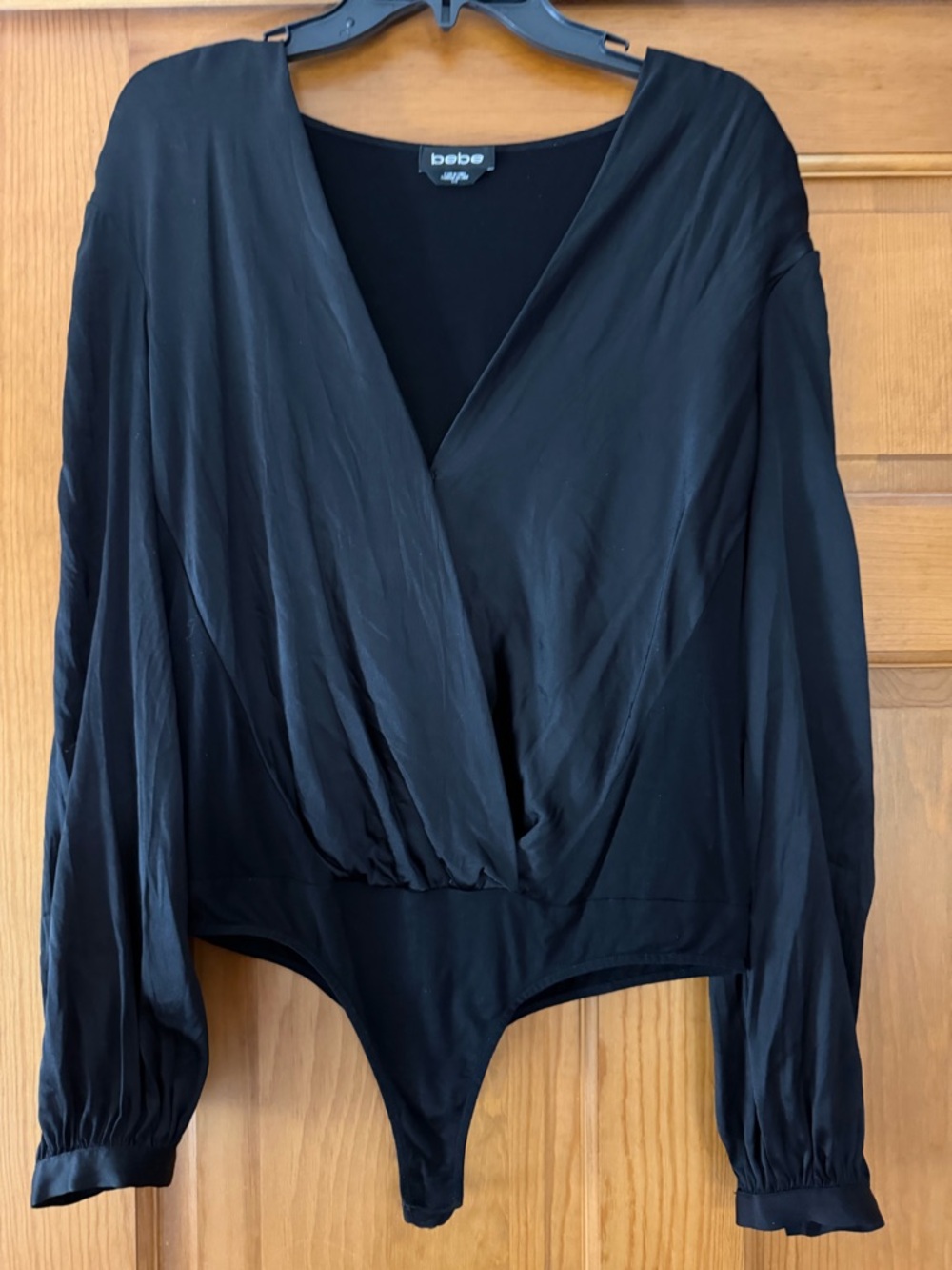 Bebe Black Long-Sleeve Bodysuit. Size large.